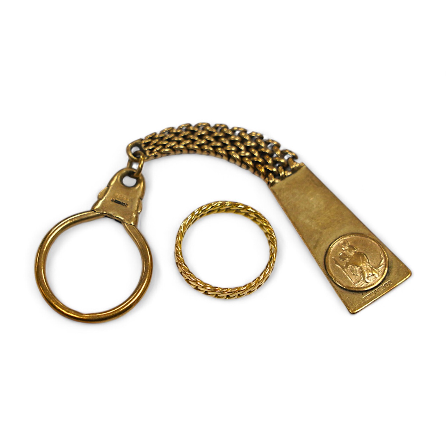 A 9ct gold key chain, with engraved inscription and a yellow metal band, gross weight 17.2 grams. Condition - fair